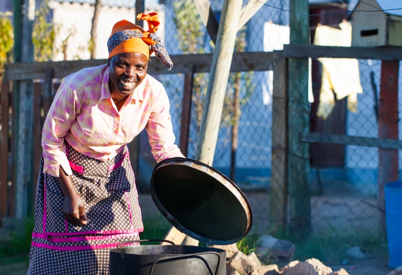 happy-woman-wearing-a-headscarf-southern-africa-trust-1.jpg